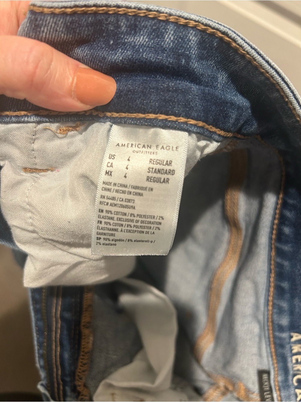 American Eagle Outfitters Ripped Mid-Blue Skinny Jeans - Picture 3 of 5
